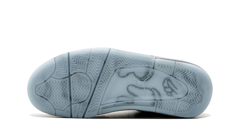 KAWS x Air Jordan 4 Retro – Rare Art Collab Sneaker with Glow-in-the-Dark Sole & Iconic XX Branding
