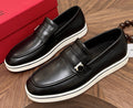 Salvatore Ferragamo Black Loafers with White Soles